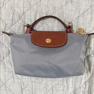 Longchamp cosmetic pouch with handle